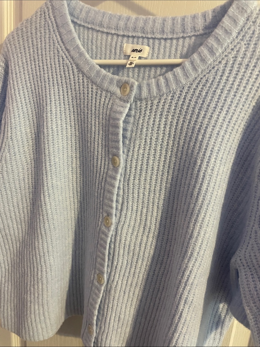 aerie Unreal Ribbed Short-Sleeve Button Front Cardigan in a light blue - Picture 6 of 10
